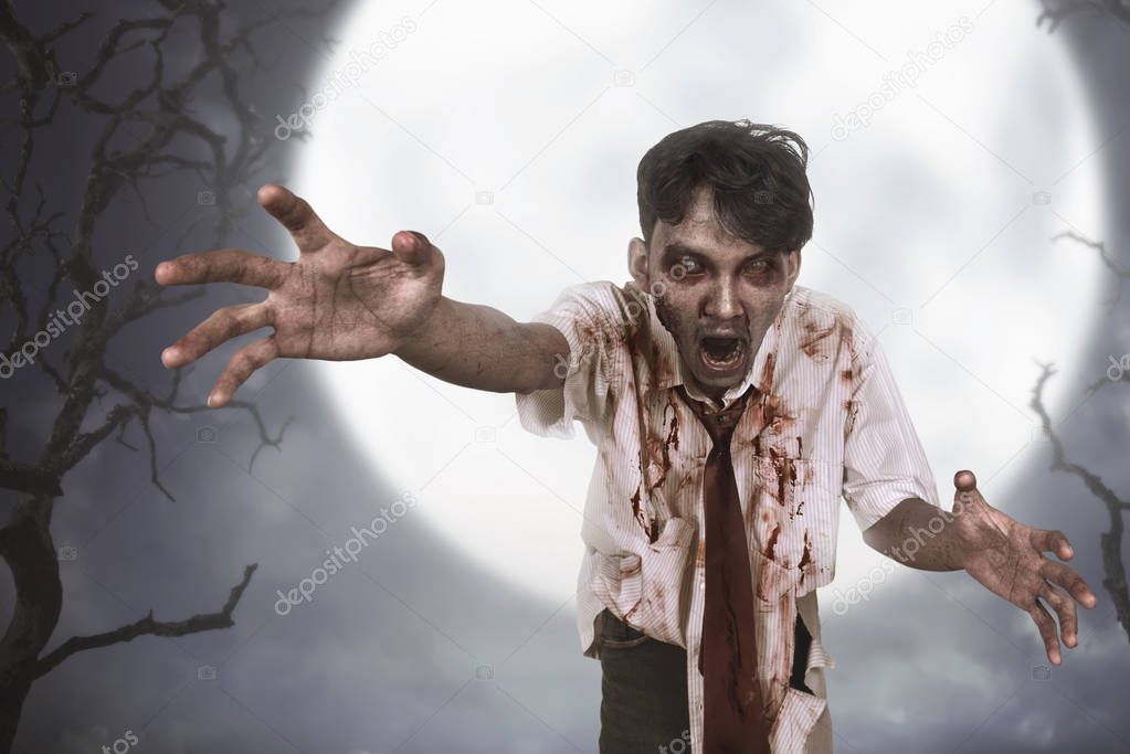 Spooky asian zombie man with wounded face 