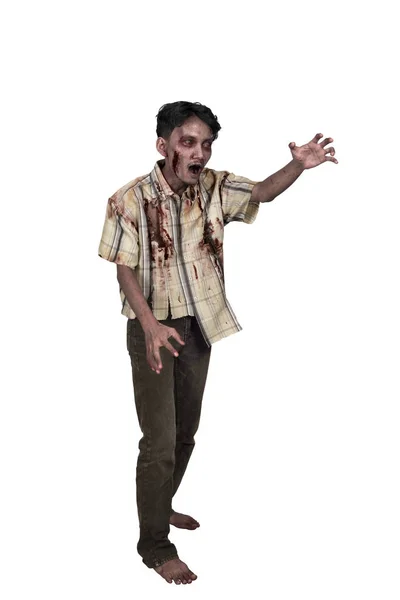Porträtt av asiatiska zombie man med klo hand stående — Stockfoto