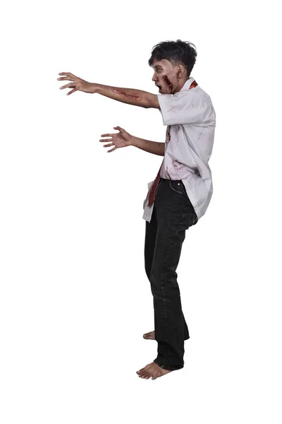 Portret van Aziatische zombie man met gewonde hand staan — Stockfoto