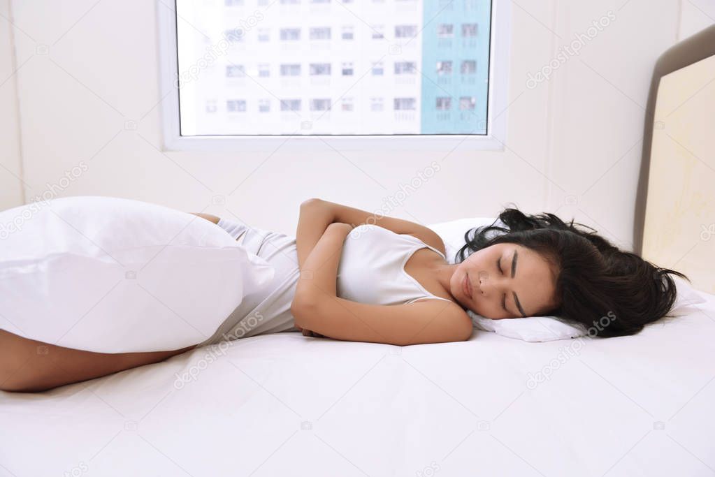 Asian woman sleeping comfortably