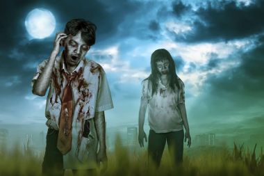 Yara ve kızgın ifade korkunç iki Asya zombiler