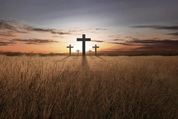 Bright christian cross at sunset — Stock Photo, Image