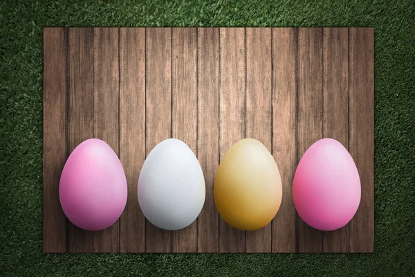 Paskalya yumurta ahşap tahta üzerinde satır — Stok fotoğraf