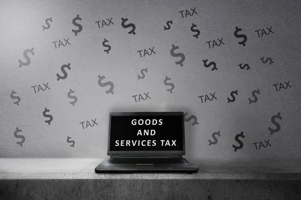 Laptop with Goods and services tax text on the screen. Goods and services tax concept