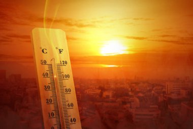 Thermometer with high temperature on the city with glowing sun b clipart