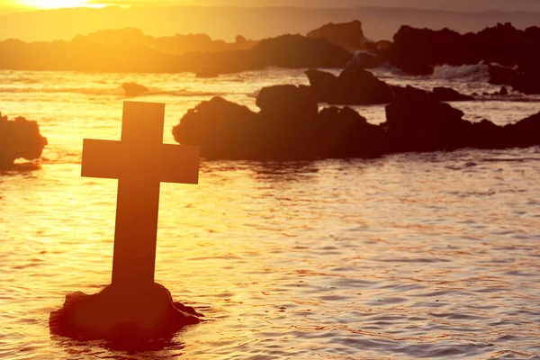 Christian Cross on the beach