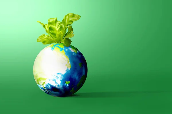 緑の背景に植物が成長している地球 地球の日のコンセプト — ストック写真