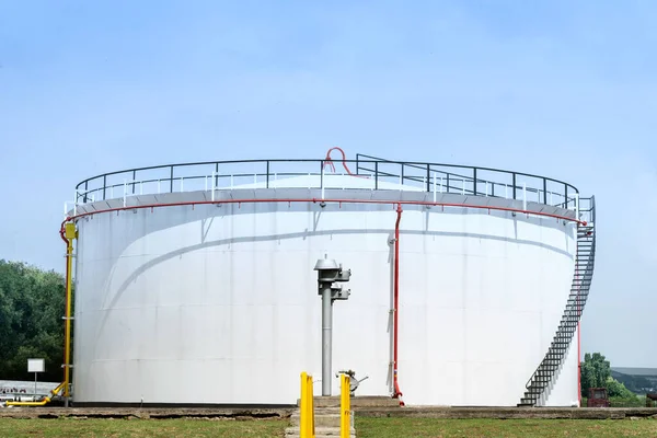 Fuel storage tank on the fuel base with a blue sky background