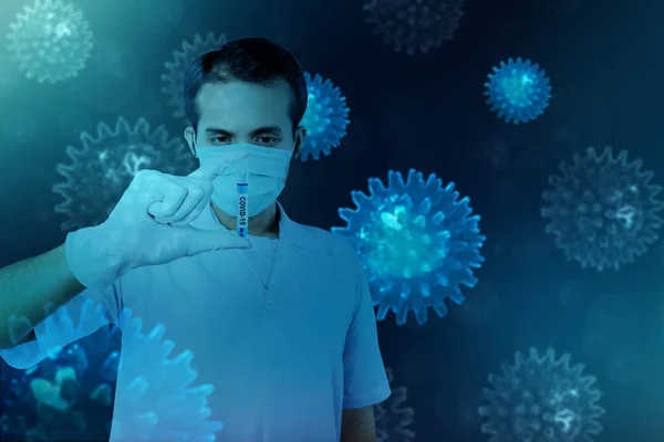 Asian doctor man in flu mask and protective gloves holding a test tube with a coronavirus sample. Prevent flu disease Coronavirus