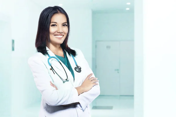 Asian doctor woman with stethoscope standing in the hospital