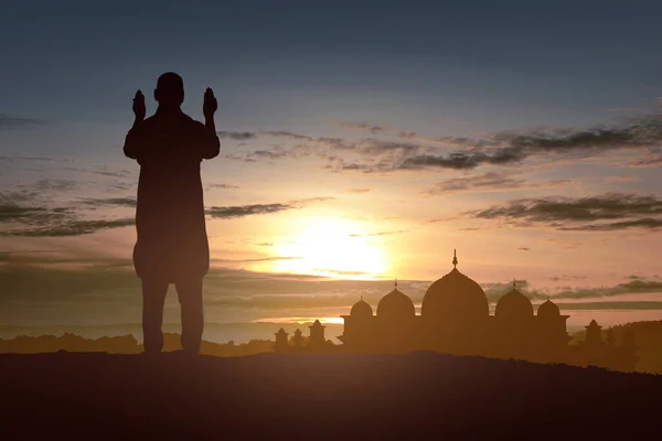 Silhouette Muslim Man Standing While Raised Hands Praying Sunset Sky — Stock Photo, Image