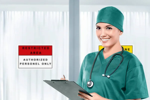 Asian doctor woman with stethoscope holding a clipboard in front of a quarantine room in the hospital. Prevent flu disease Coronavirus