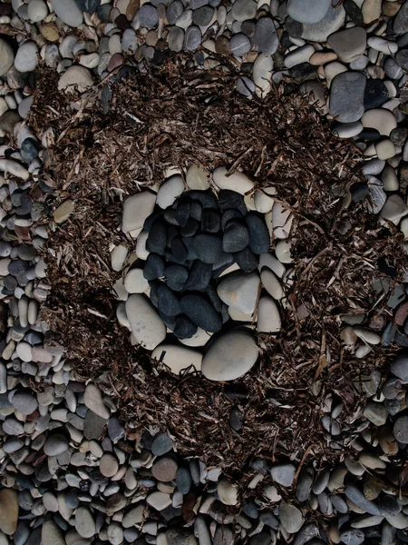 A figura de círculos concêntricos em uma praia de seixos — Fotografia de Stock