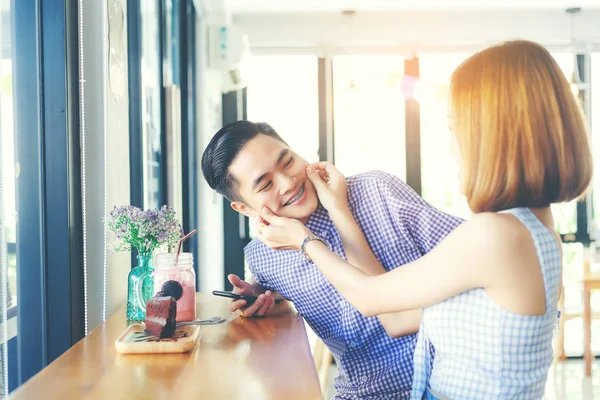 Women couple in cafe