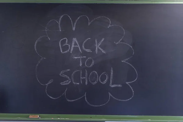 Back to school written on a blackboard — Stock Photo, Image