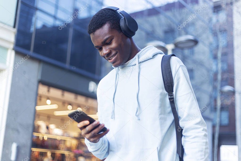 African Young Man Listening Music.