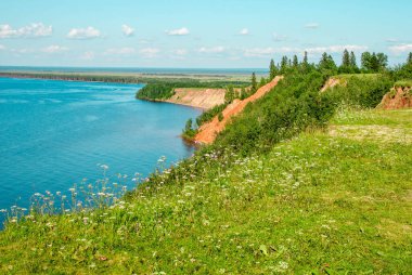 Andoma Cape with Andoma Hill at Onega Lake, Vologda region, Russia. Natural background view. Text copy space.