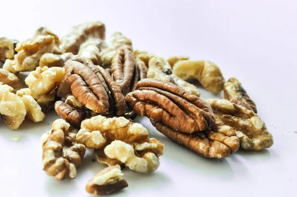 Healthy mixed nuts - walnut and pecan with rosemary