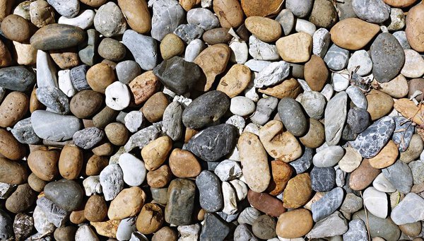 Камень на земле в природе, галечный фон, скала