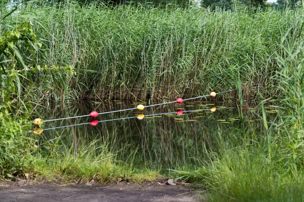 Buoy line over canal — Stock Photo, Image