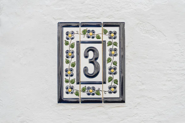 Number three on white wall — Stock Photo, Image