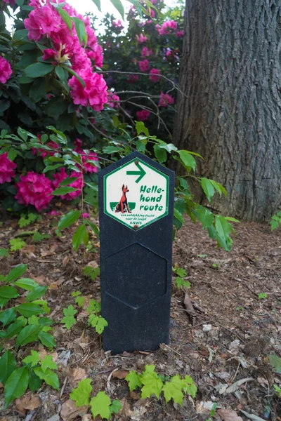 Hellhound (hellehond in dutch language) walking route sign. A hellhound (also hellhound or kardoes) is a mythical creature that appears in folk tales worldwide.Seeing a hellhound is an omen in popular belief. In some stories, the animal is associated