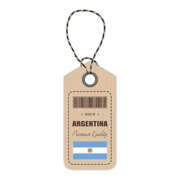 Cuelgue la etiqueta hecha en Argentina con icono de la bandera aislado sobre un fondo blanco. Ilustración vectorial . — Vector de stock