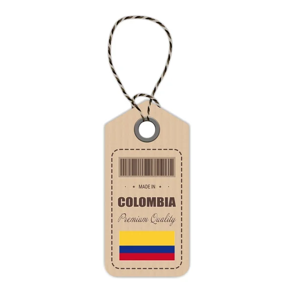 Cuelgue la etiqueta hecha en Colombia con el icono de la bandera aislado sobre un fondo blanco. Ilustración vectorial . — Archivo Imágenes Vectoriales