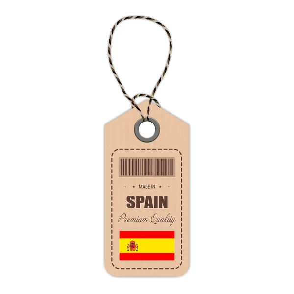 Häng Tag gjort i Spanien med flaggikonen isolerad på en vit bakgrund. Vektorillustration. — Stock vektor