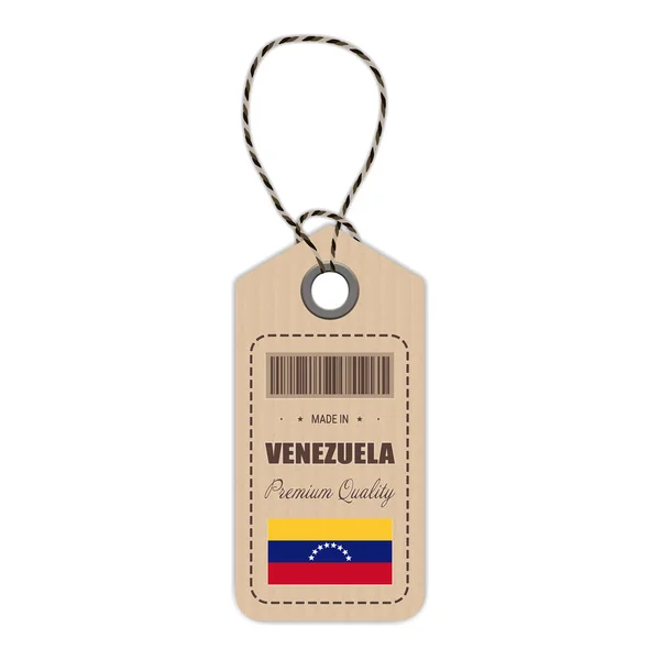 Cuelgue la etiqueta hecha en Venezuela con el icono de la bandera aislado sobre un fondo blanco. Ilustración vectorial . — Archivo Imágenes Vectoriales
