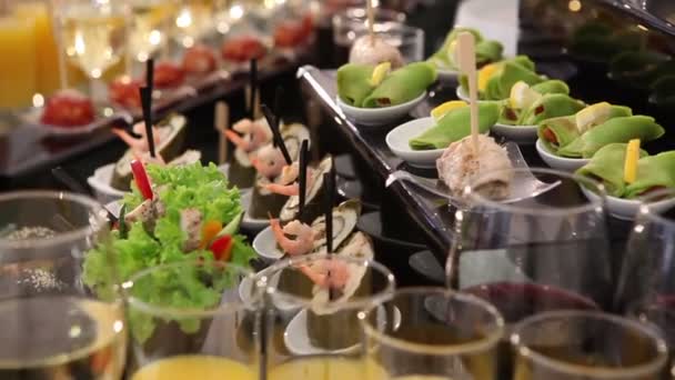 Banquet table with Chinese food, rolls, fish, sashimi, new year 2018, Table full of food, panorama, christmas, wedding, table full of food — Stock Video