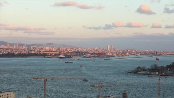 Wide frame of the Bosphorus Strait, sea port and cargo ships in the Bosphorus at sunset — Stock Video