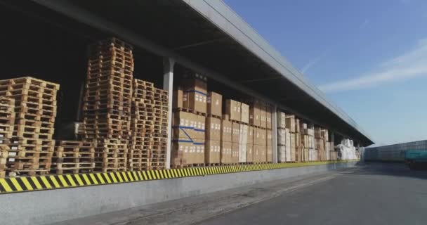 Large warehouse with boxes, modern warehouse top view, a lot of goods ready for shipment — Stock Video