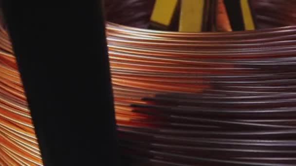 Close-up of a winding copper cable in a cable factory. Cable manufacturing — Stock Video