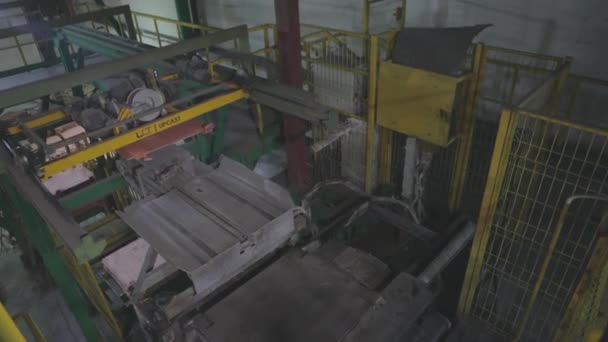 Automated loading of metal in the furnace. The process of melting copper in the furnace. — Stock Video