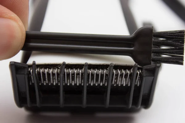 Adam siyah saç kesme makineleri temizlik