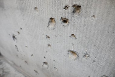 Details with bullet holes in a wall from the Romanian anti commu