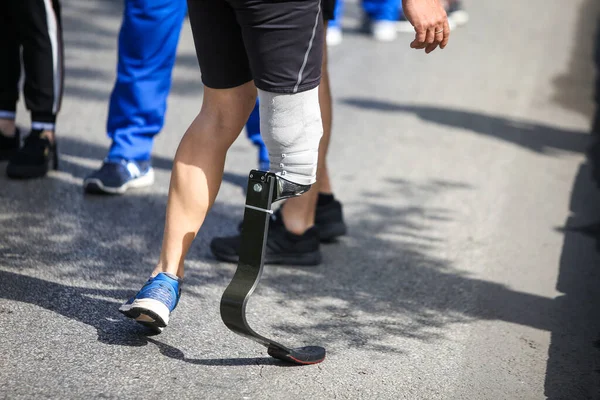 Details with a prosthetic leg on an army veteran during a running race