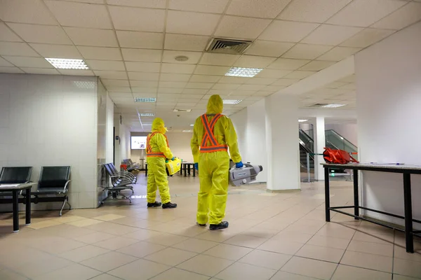 Otopeni Romania February 2020 People Wearing Protective Suits Spray Disinfectant — Stock fotografie