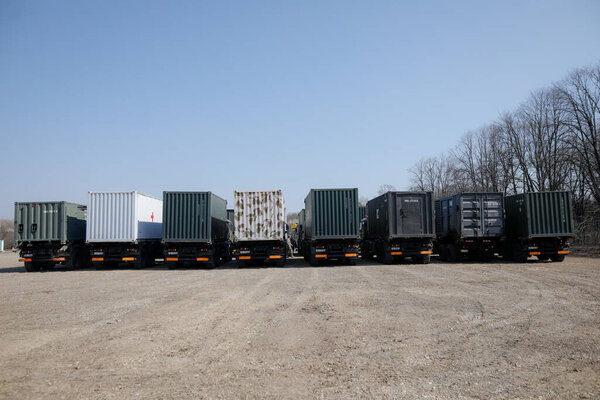 Otopeni, Romania - February 19, 2020: Personnel of the Romanian Army work on the installation of a campaign mobile hospital (ROL 2) to treat Covid-19 patients.