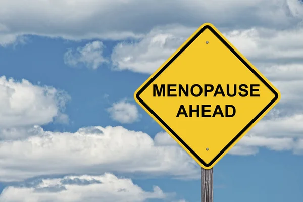 Let op teken Blue Sky - menopauze — Stockfoto