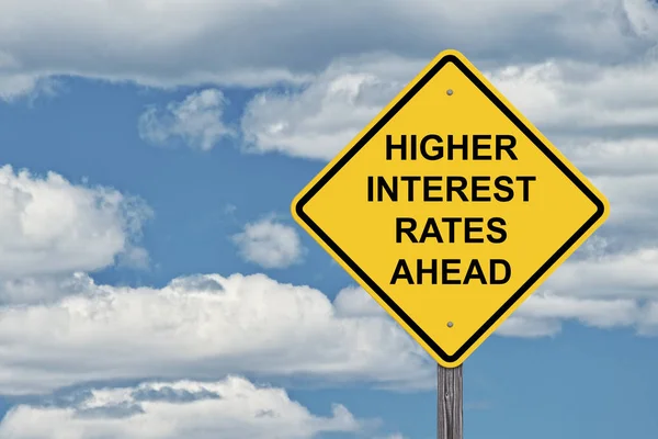 Warnsignal blauer Himmel - höhere Zinsen — Stockfoto