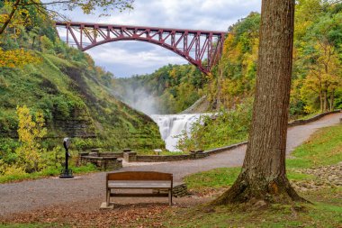 Upper Falls And Genesee Arch Bridge At Letchworth State Park clipart