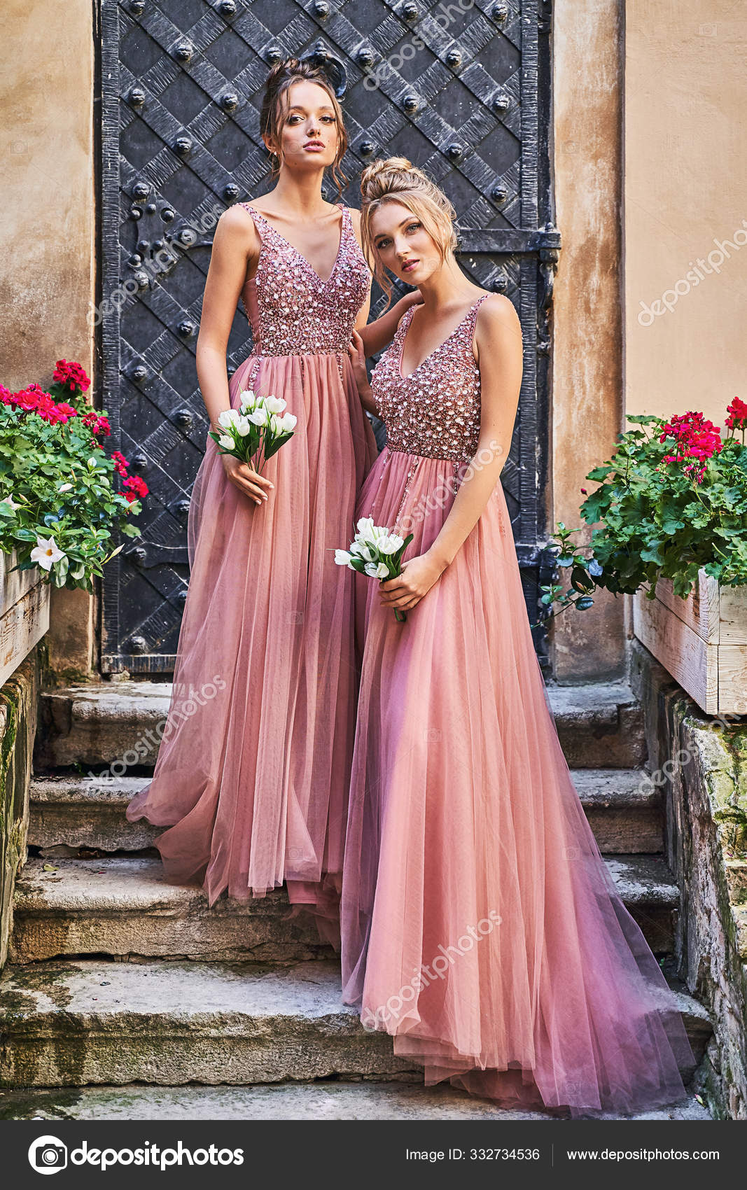 Beautiful bridesmaids in gorgeous elegant stylish red pink violet floor  length v neck chiffon gown dress decorated with sequins sparkles and  rhinestones holding flowers bouquets. Wedding day in old Photos | Adobe