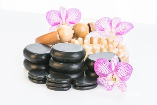 Spabehandling Med Varma Stenar Massage Rulle Celluliter Massager Och Orkidéer — Stockfoto