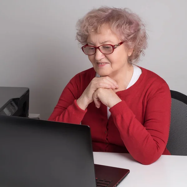 Elderly Woman Working Laptop White Table — Stock Photo, Image