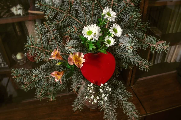 Bouquet of branches silver fir and flowerswith red box heart — Stock Photo, Image