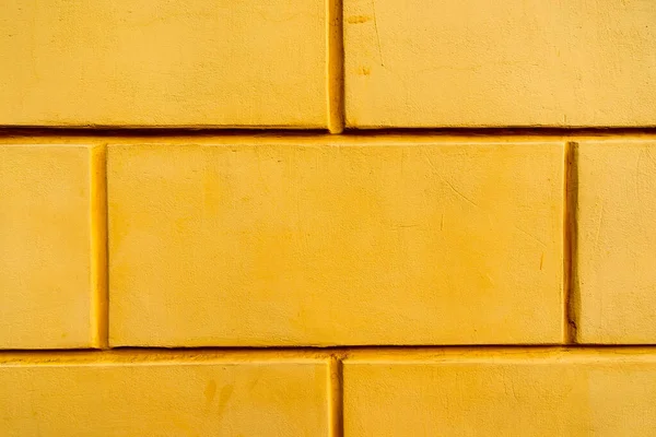 大块旧砖制成的黄色纹理墙 — 图库照片