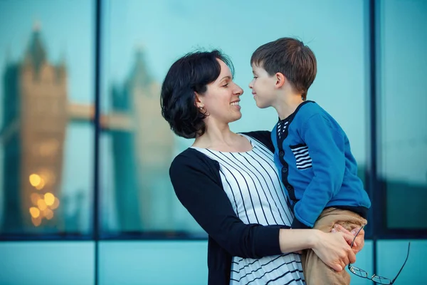 Loving mother and son hugging outdoors — Stock Photo, Image