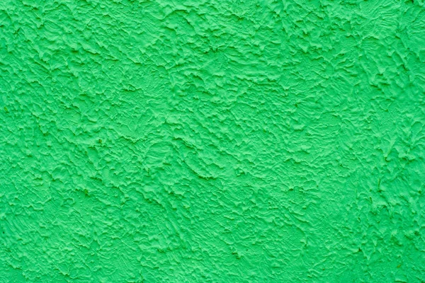 Sfondo di una parete ruvida di un'ombra verde — Foto Stock